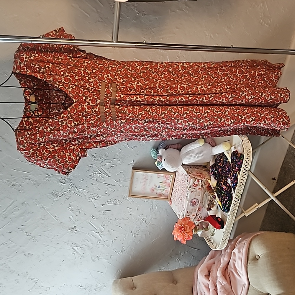 Boden abstract floral dress in red and brown. Side zipper. Size 10L.